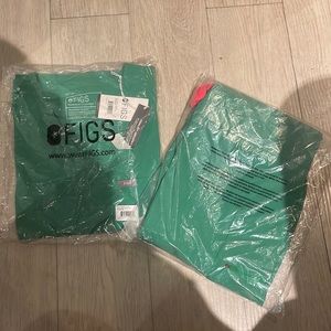 Brand new safety green Figs size medium scrubs.